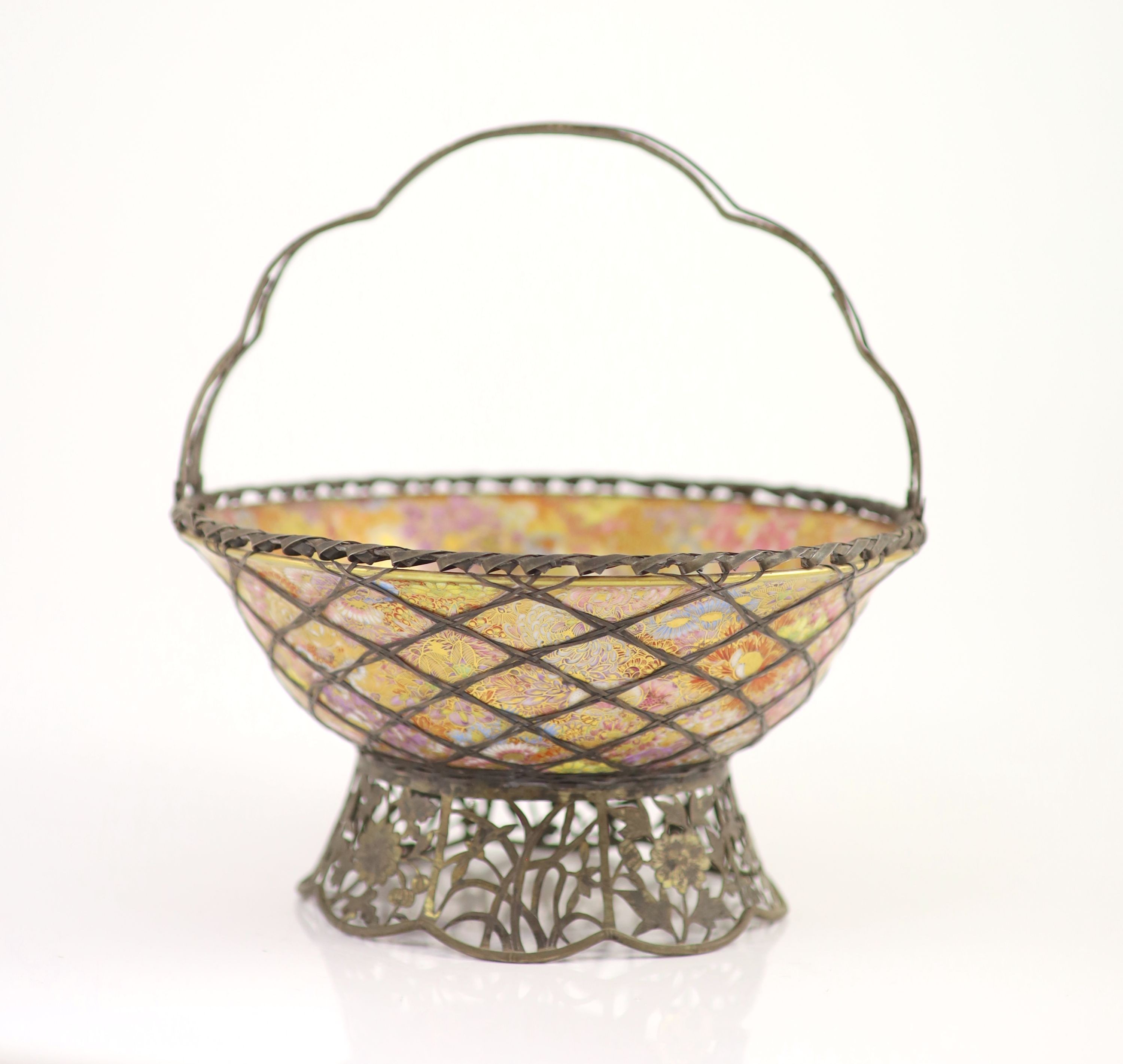 A Japanese Kutani porcelain and white metal mounted basket, Meiji period, 22.5 cm diameter